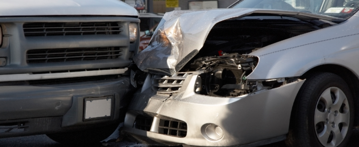 Two cars in a head-on collision