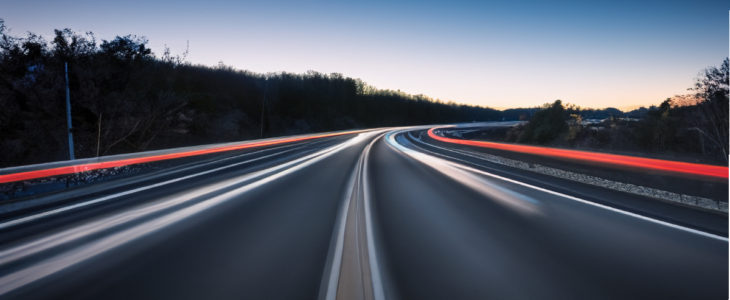 Speeding car along highway