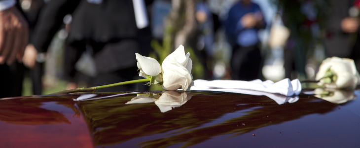 Rose on a casket to represent wrongful death