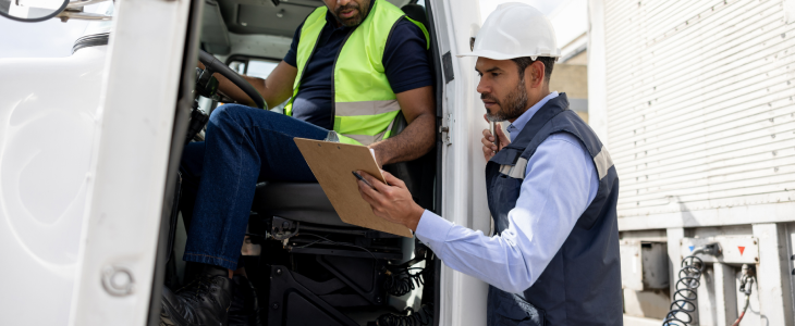 Truck driver speaking with a boss